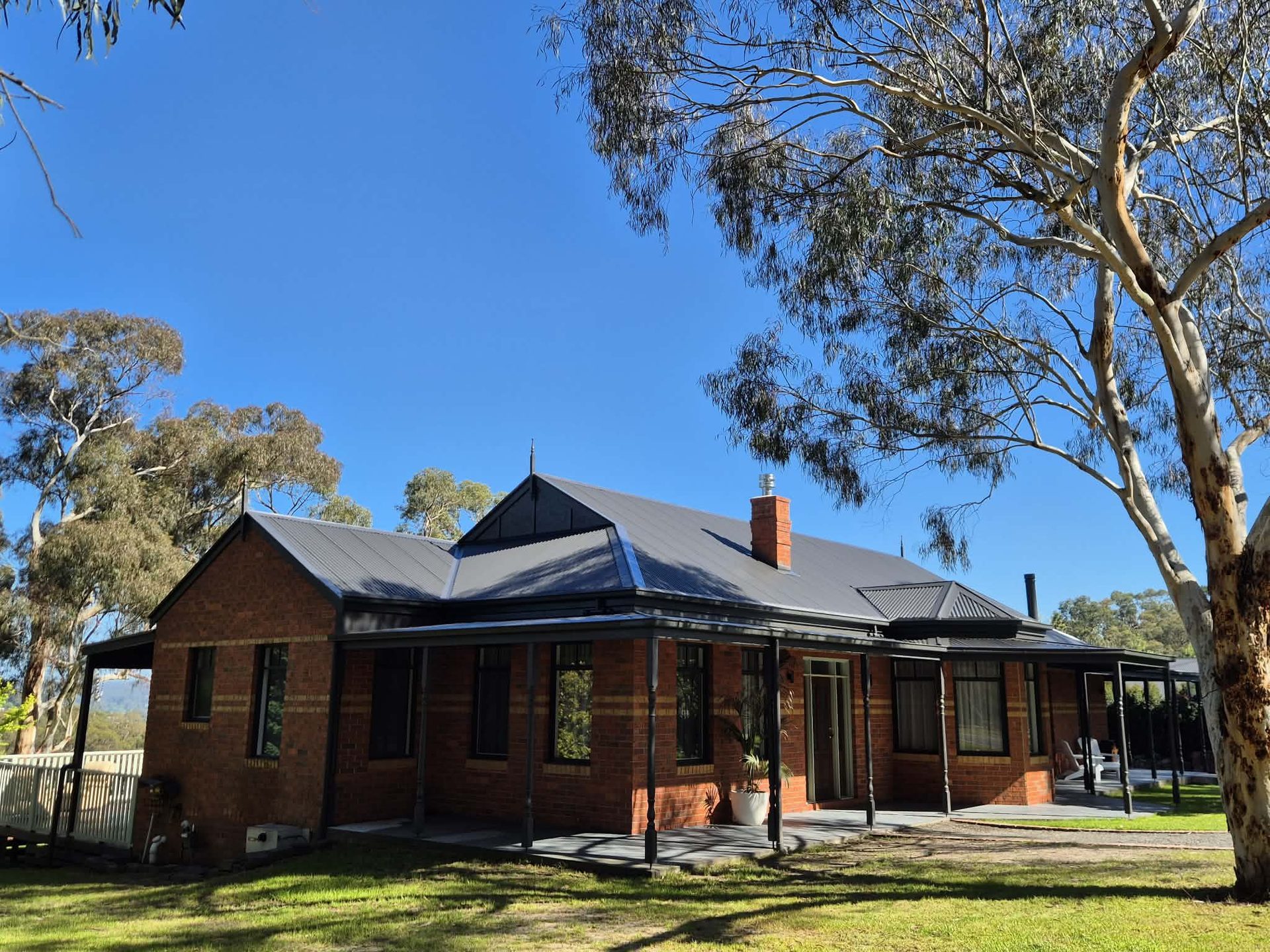 Same Federation home restored in charcoal Colorbond