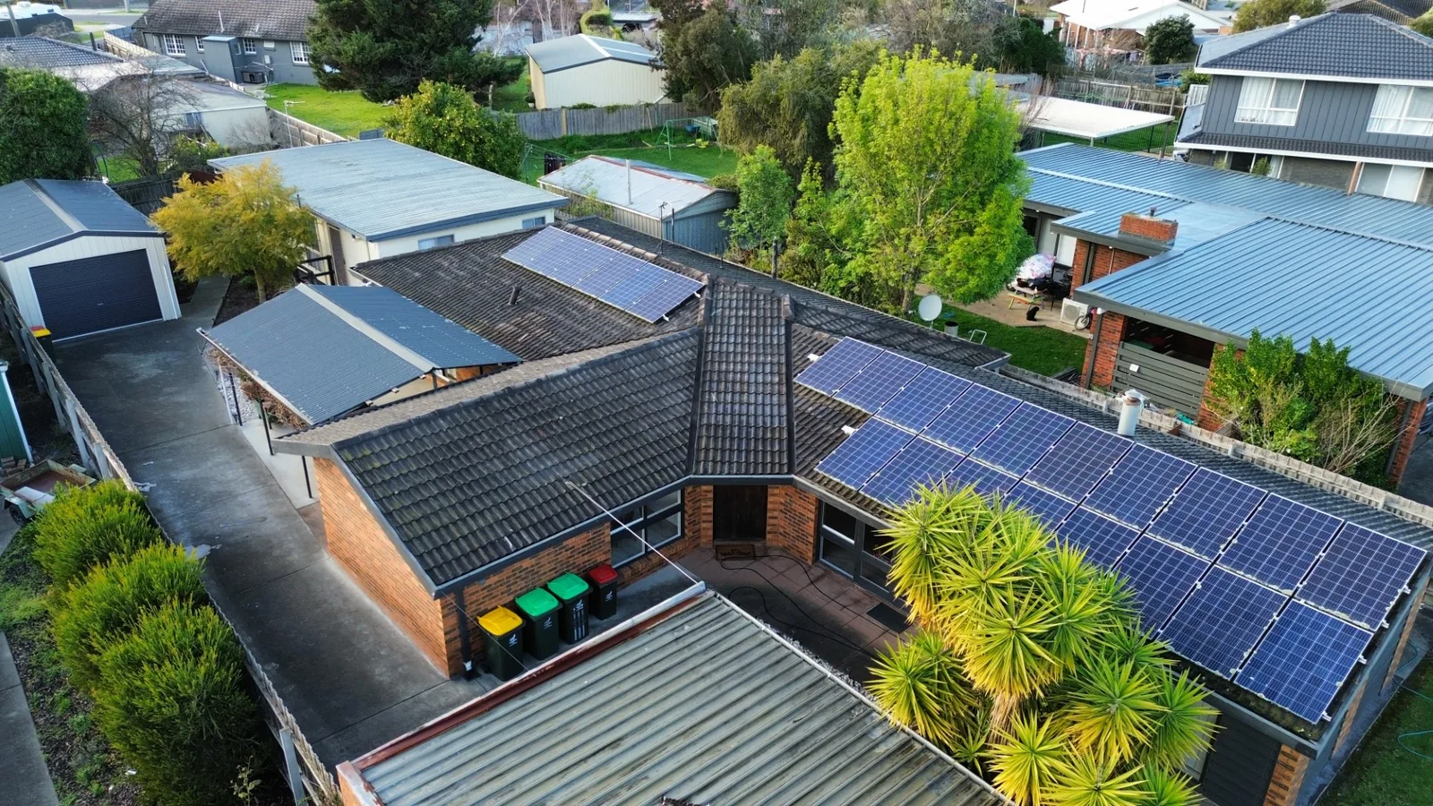 restored dark tile roof with solar panels, aerial view, Gippsland VIC