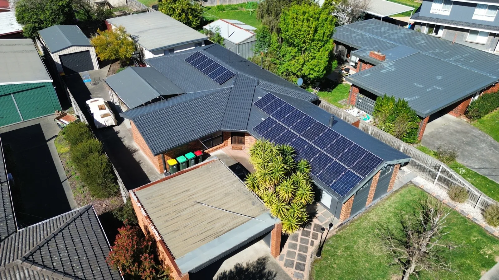 restored charcoal tile roof with solar panels worked around, Gippsland VIC