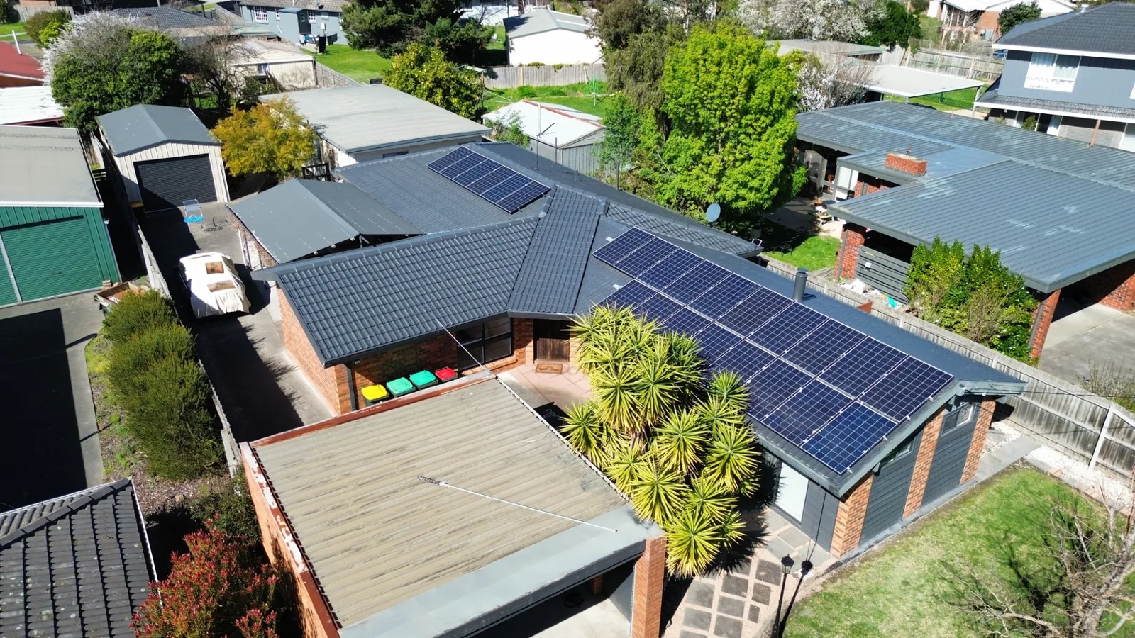 restored tile roof on a Gippsland brick home, aerial view